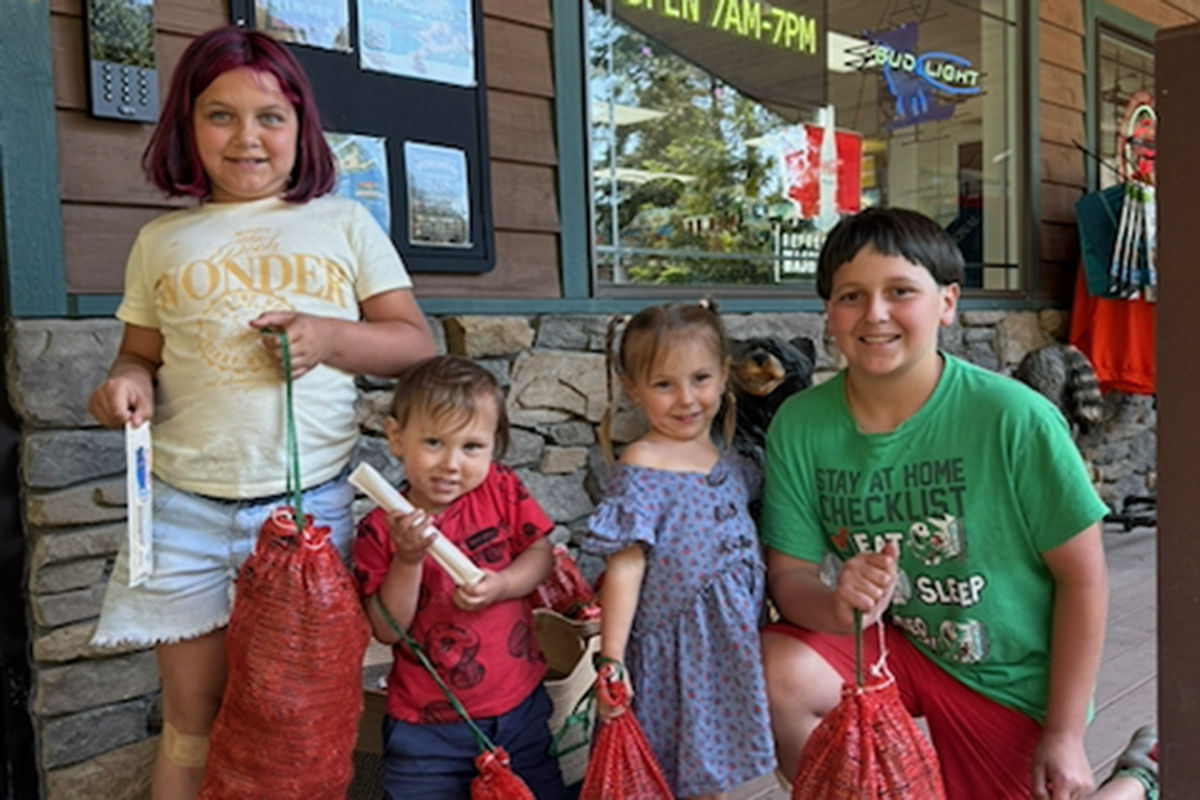 Kids with fish.
